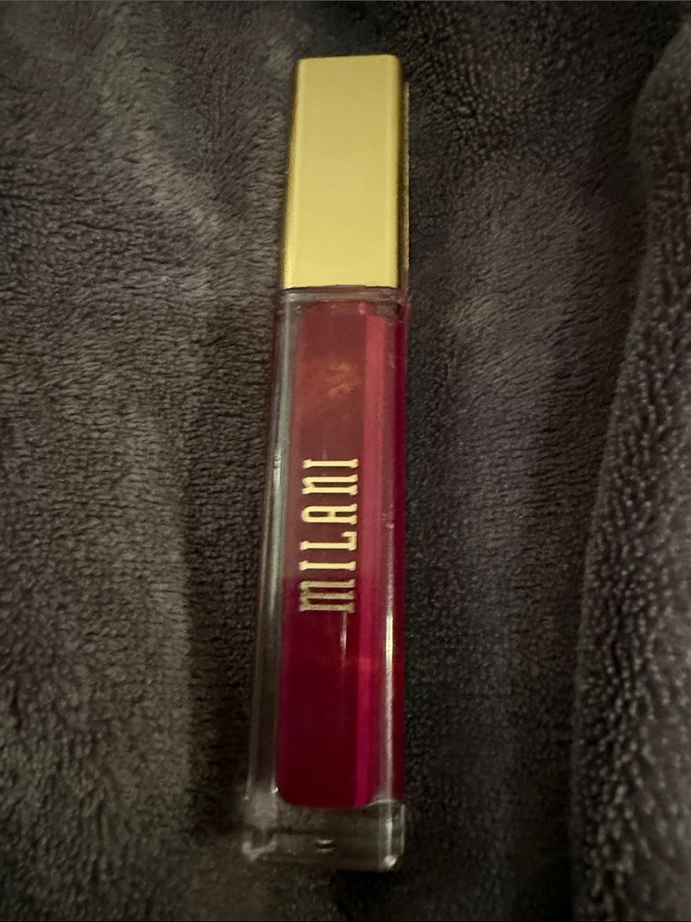 Milani Liquid lipstick in shade obsession (purple) Gold Cap